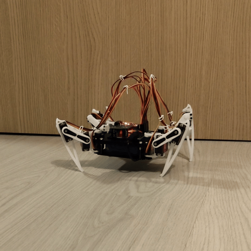 The Quad Legged Spider Bot moving - front view.